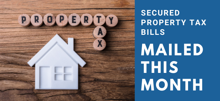Property Tax wooden tiles - "Secured property Tax Bills Mailed This Month"