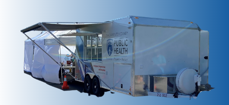 Mobile vaccination trailers on a blue background